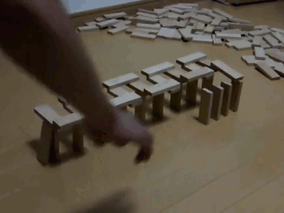 Two-stage domino. sub for more funny pics and gifs.. it starts vertically, goes horizontal, then back vertically. it has three stages.