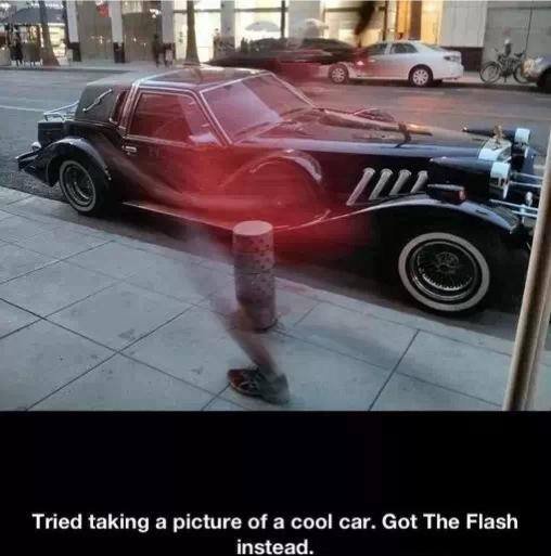 fastest man alive. . Tried taking a picture of a cool car. Got The Flash instead,. Should have turned on the flash.