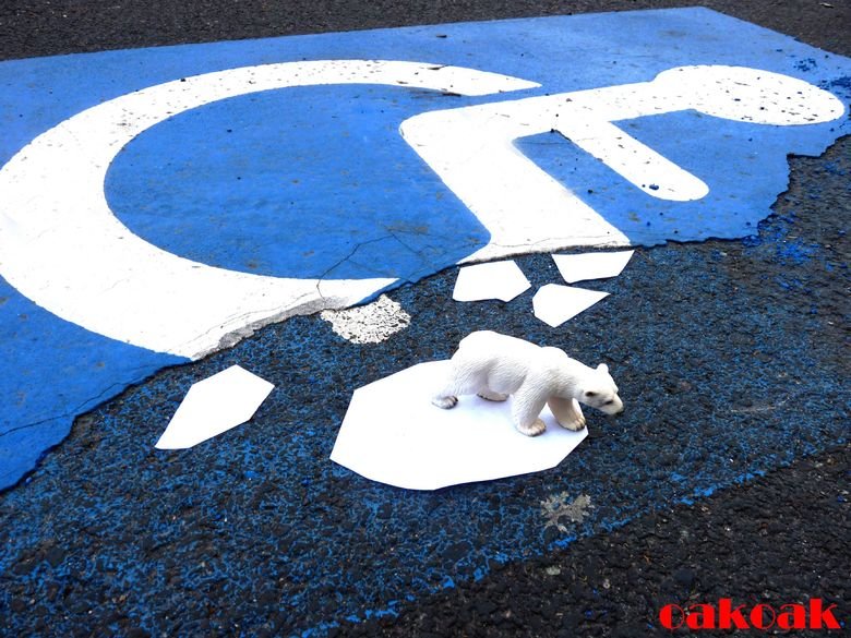 Hand-ice-cap. Clever street art by French artist OaKoAk..