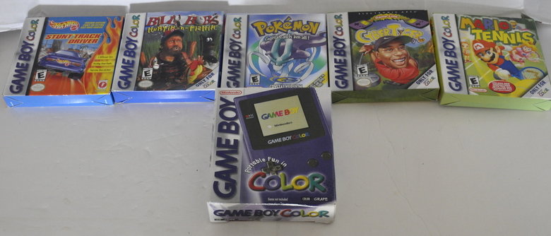 hey funnyjunk, look what i got.. so this lady sold my uncle all this at a garage sale everything is brand new, unopend, gameboy for 5$ and all the other games f