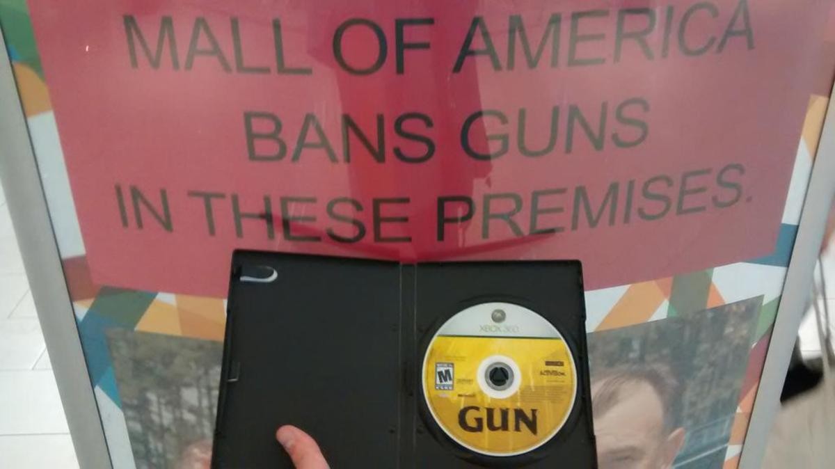 HOW YOU COULD YOU BAN ONE OF MY FAVORITE GAMES. .. Oh no, guns are banned. I, as someone who plans on breaking the law and killing people, will abide by this sign that tells me this is a no gun zone.