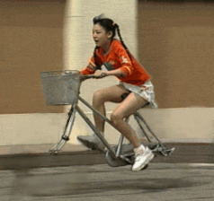 how to describe 4chan. an asian girl riding a speeding bike with no wheels. 4chan described... &lt;&lt;&lt;
