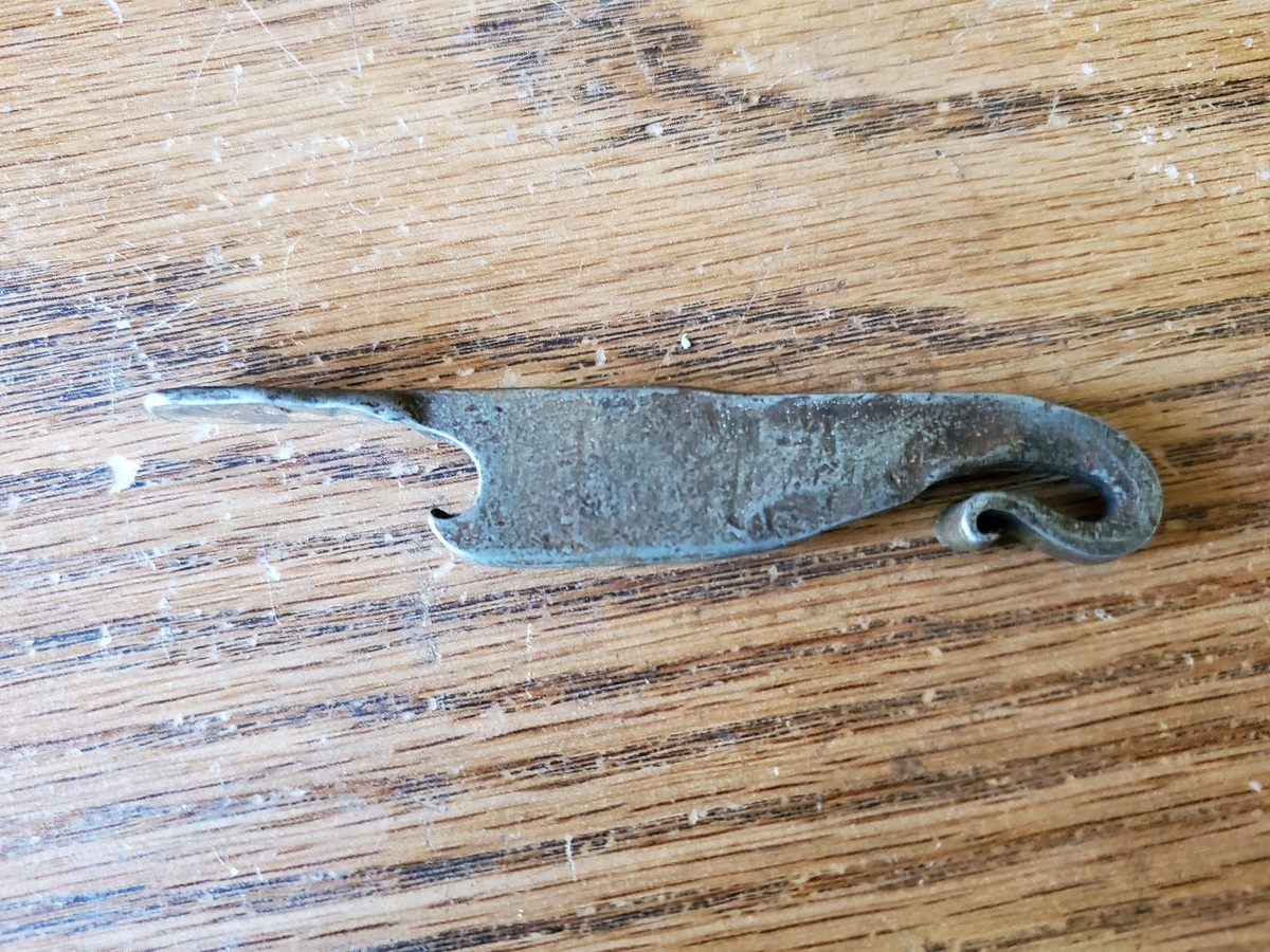 I made this, but now can't remember how to do it again. Help?. .. I can safely say that it's some sort of metal, so my advice is that you heat it up and then bang on it with a hammer You're welcome