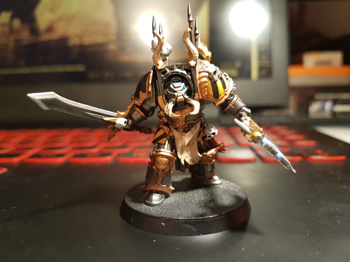 Iron Warriors Terminator. .. I dont even play and I feel like buying a few of these small figures just for fun