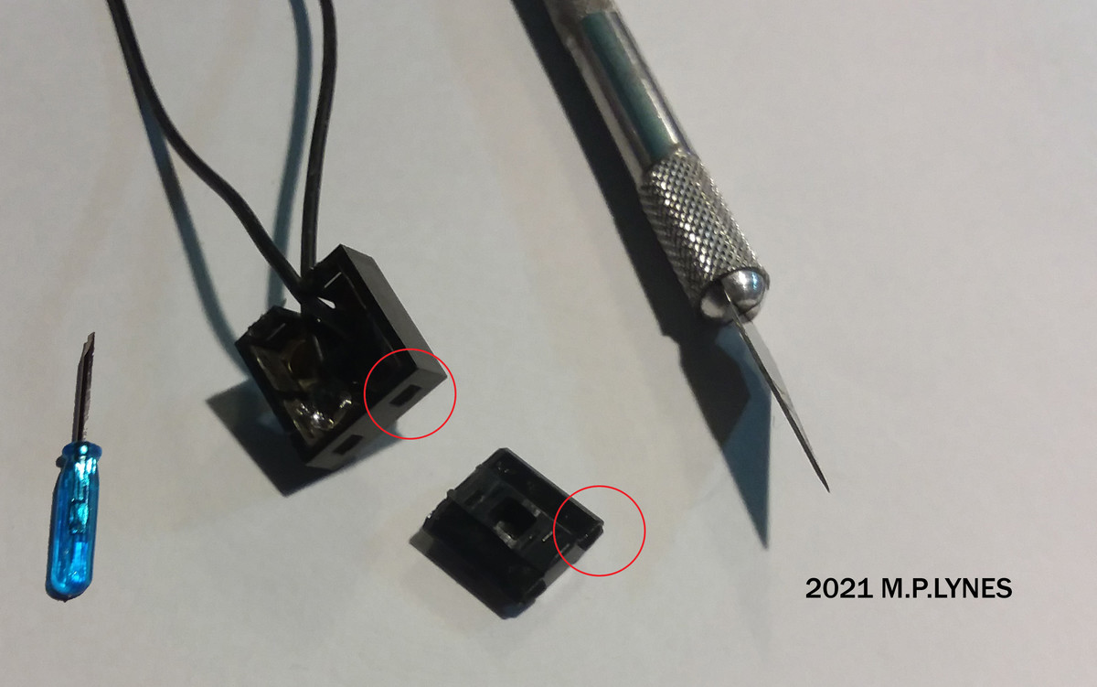 Lego 9v Train Wire Clip Repair Guide w/ Wiring Diagram. First step is to push the tabs to open up the bottom panel. If that doesn't work, try cutting down the s