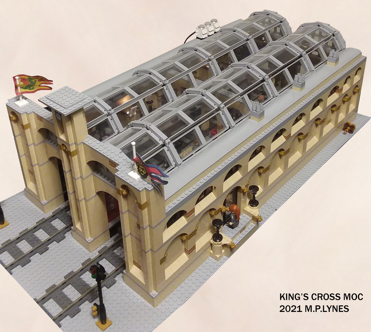 Lego King's Cross at ht: Classic 9V Light System. Phase 1 of the renovations complete. The Lego 9v wire and lights are installed underneath the slopped roof pie