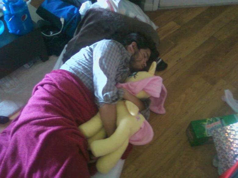 my ex.... stayed at his friend's house and found him like this in the morning... a man sleeps with a stuffed animal but a real man sleeps with stuffed pony