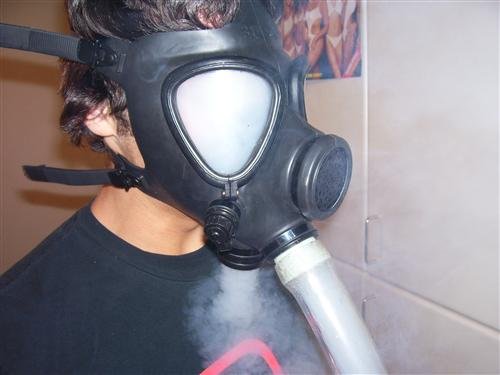My Finished Bong Gask Mask. I finally finished my gas mask! it works good ^^&lt;br /&gt; i will try to get more pics of me toasted using it.. I probably wouldn't strap the damn thing to my head...To big of a hit and you're pretty if you can't get it off lol.