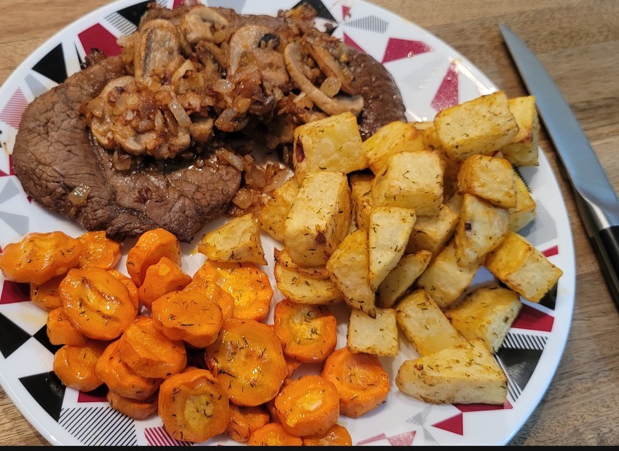 Not quite tendys. Grilled steak, topped with fried onions n mushrooms, oven roast carrots and air fried taters.. Get your pan hotter befire cooking your steak