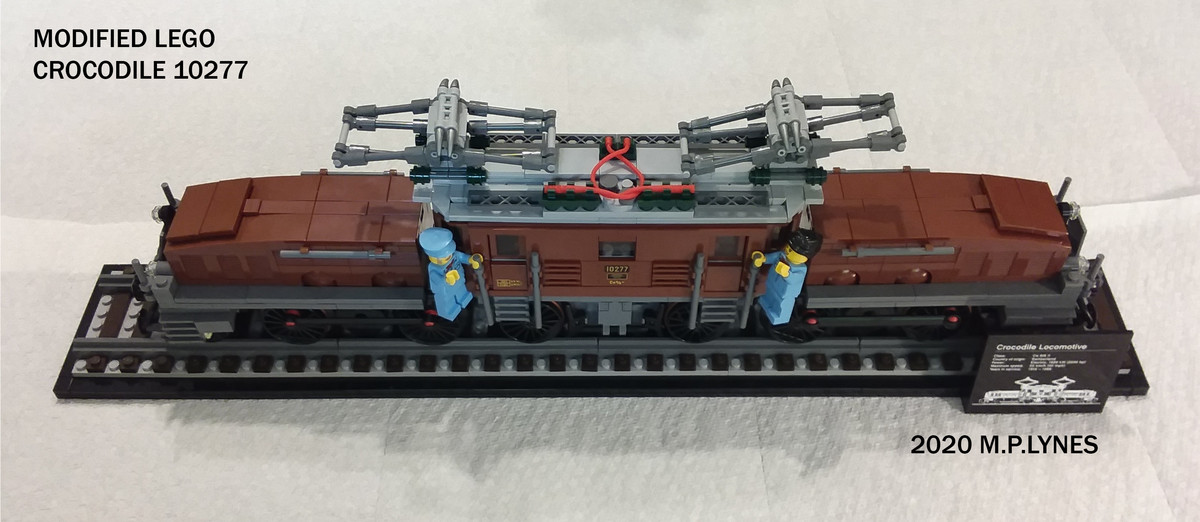 Simple mod to new Lego Crocodile to fix derailment issue.. Modifications are intended to not interfere with the original looks of the Crocodile set but instead 