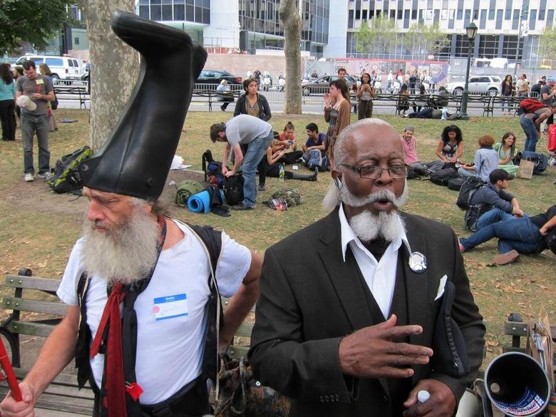 Two legends. This dude's rubber boot hat is too damn high.